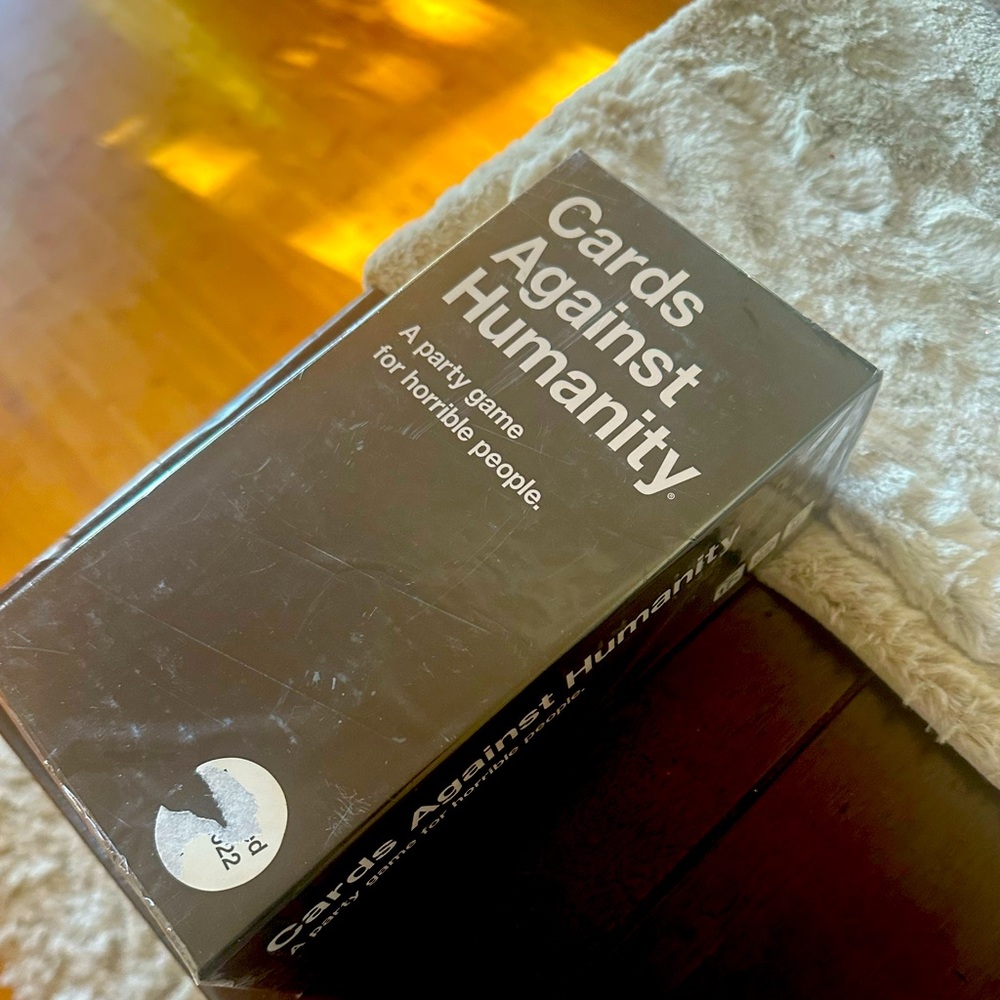 Cards Against Humanity Main Party Pack.  Still in package.  Brand new.
